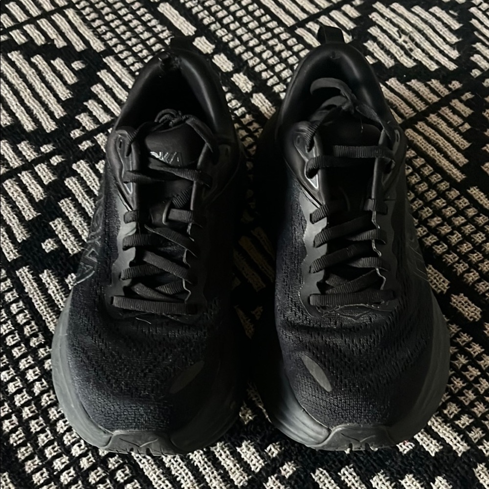 Hokas black running shoes